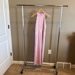 Glittery Pink Jumpsuit wish rhinestone belt. Bow accent at shoulders. Size 16.